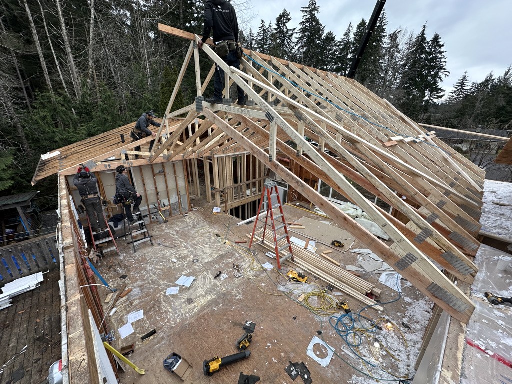 New roof structure being framed over a home renovation by VIP Homes