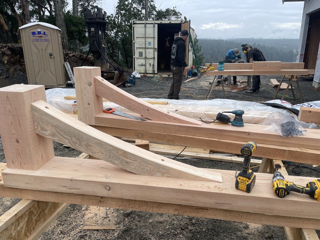 Heavy timber brackets laid out and finished on site before installation