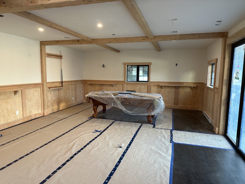 Interior room with timber wainscot panelling part way through finishing